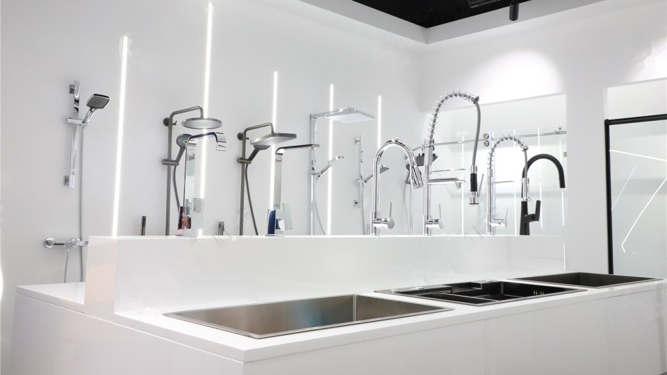 Shower systems, pull-down kitchen faucets and stainless and composite kitchen sinks